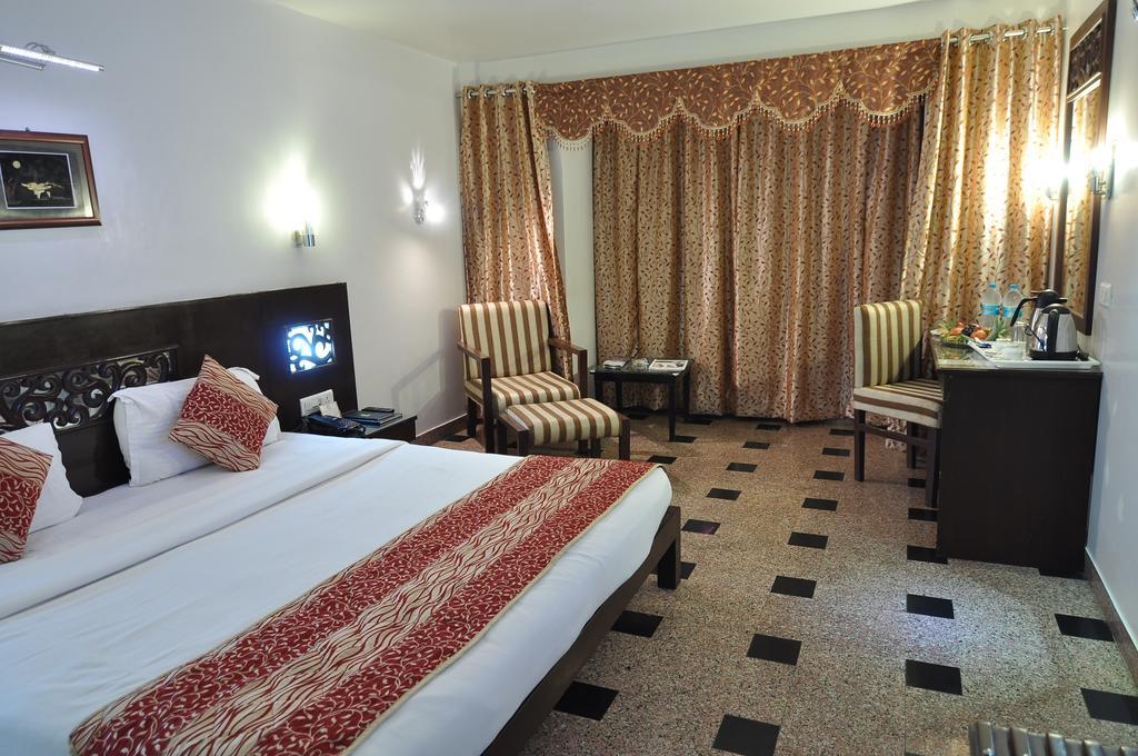 Hotel Venkatesh International Rāipur Oda fotoğraf
